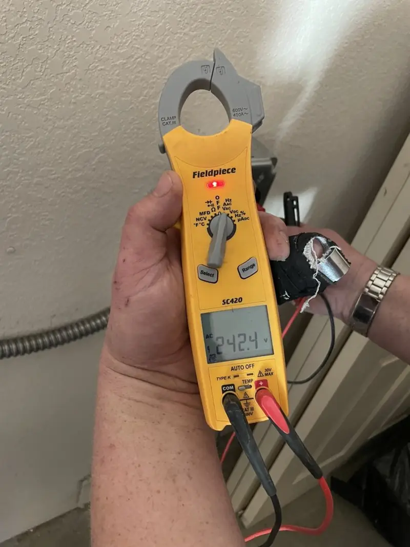 Voltage testing with clamp meter during Aluminum Wiring Replacement in Newcastle